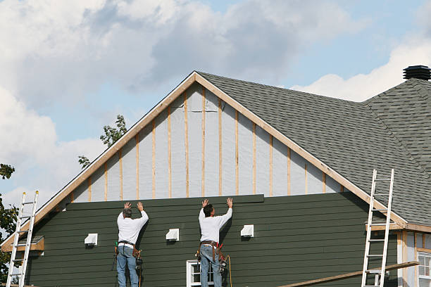 Professional Siding Replacement technician working in Woodbury, PA